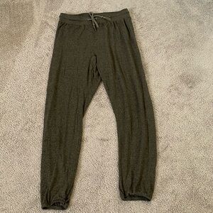 Out from under green jogger